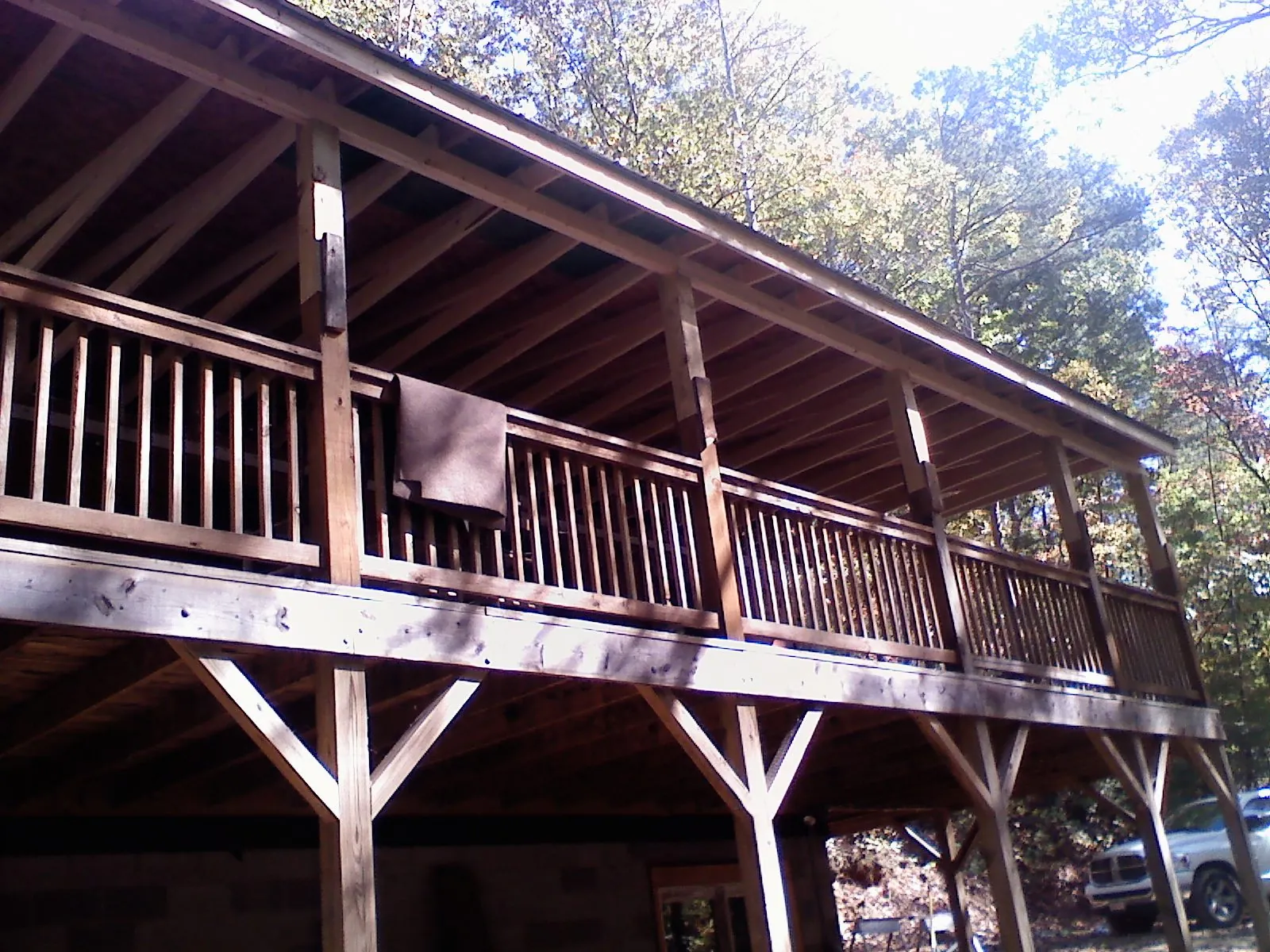Timber framing under a new elevated porch and deck — Roof Leak Repair in West Manchester by Roofing Brothers